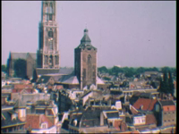 12793BB02491 Een film met beelden van de Dom te Utrecht, de kaasmarkt te Alkmaar, een kamper ui-dag en het station te ...