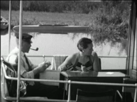 4809BB03835 Een familiefilm van de familie Van Loo, met beelden van:- De familie aan dek van een boot varend op de ...