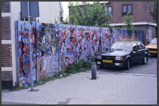 24995 DIA000492 Graffiti op een betonnen muur aan de Molenweg hoek Eendrachtsstraat, 1987 in Assendorp., 1987-05-00