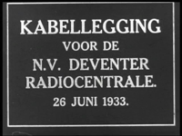 54 -FILM Radiocentrale, kabelleggen voor NV Deventer.Film zonder geluid. Lossen van grote haspels N.M.F. Delft met ...