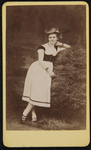 43 -113 Portret van een vrouw naast een hooibaal., 1868-01-01