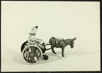 215 Wagen met mannetje getrokken door ezel. Collectie Speelgoedmuseum., 1972-01-01