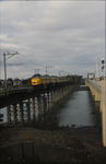 3546 Gezicht vanaf de nieuwe spoorbrug., 1982-03-01