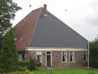 WAT120003325 Stolpboerderij de '' Uilenhoek'' '' aan de Westerweg nummer 69.
