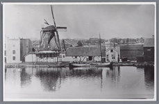 WAT002002378 Aanzicht op molen de Hoop (bijgenaamd het Kuyke)Deze stellingmolen dateert uit 1680 en diende sinds 1727 ...