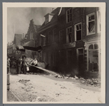 WAT001005619 Op 6 juli 1959 ontplofte op de Koemarkt een vuilniswagen. De oorzaak was de kort daarvoor geladen ongeveer ...