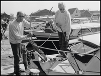 WAT003004157 Jachthaven W.s.v. De Noord vierde zijn twintig jarig bestaan.Op de foto Henk en Trina Coolen op hun boot ...
